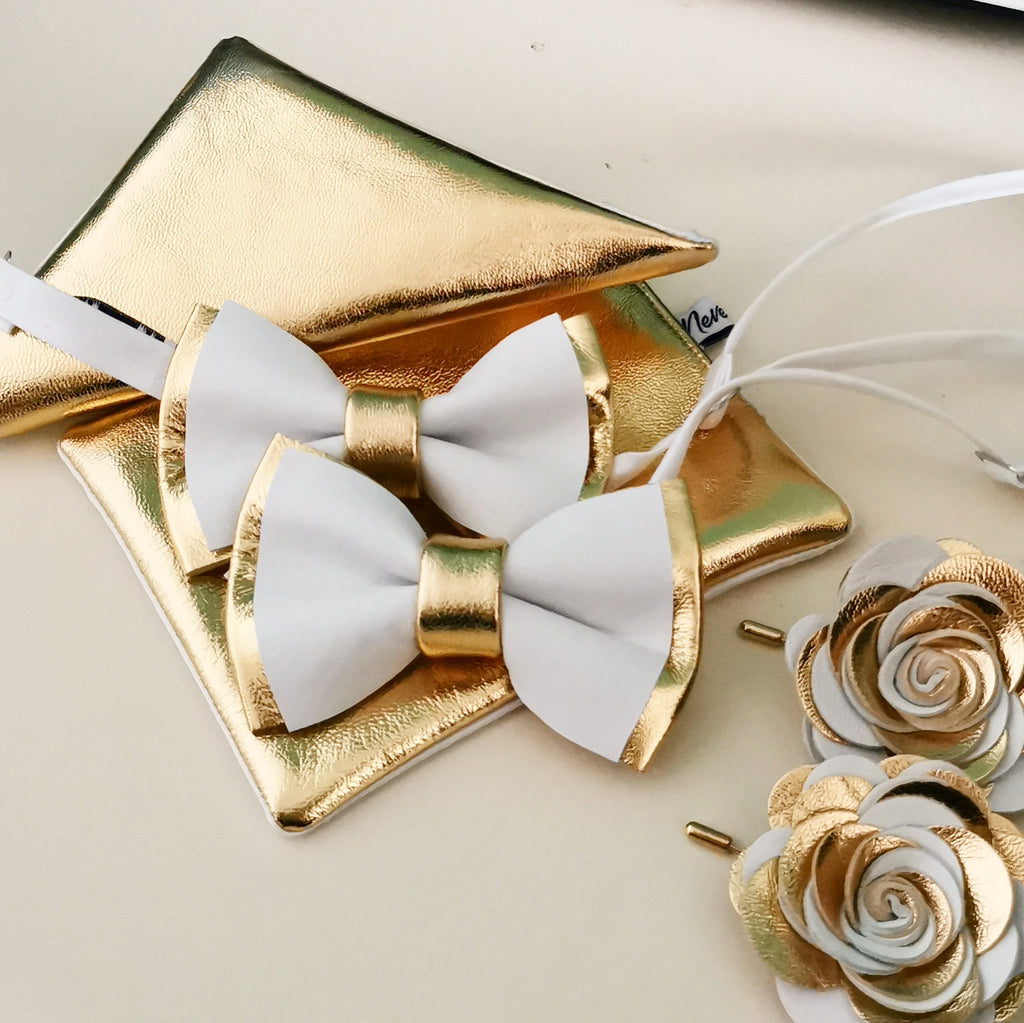 white suit with gold bow tie