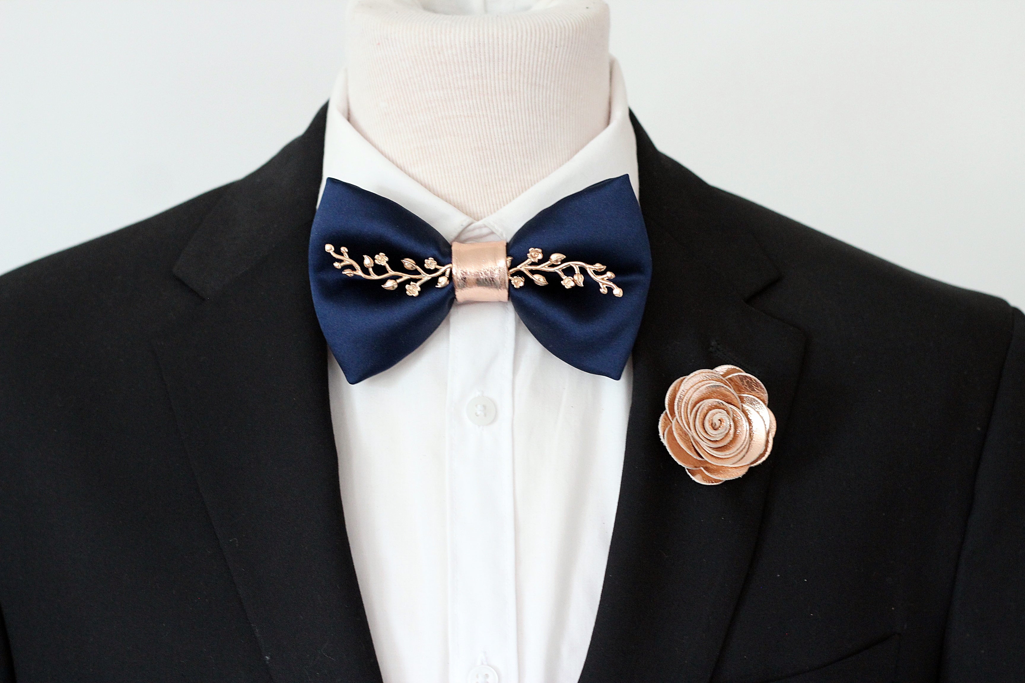 rose gold dress and navy blue suit Bride in Gold Dress and Groom in Navy Suit