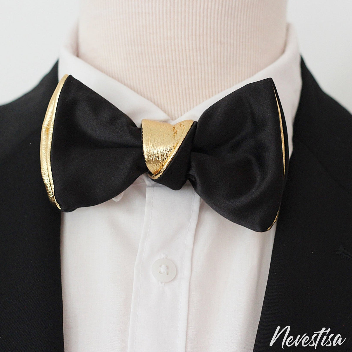 black tux with gold bow tie